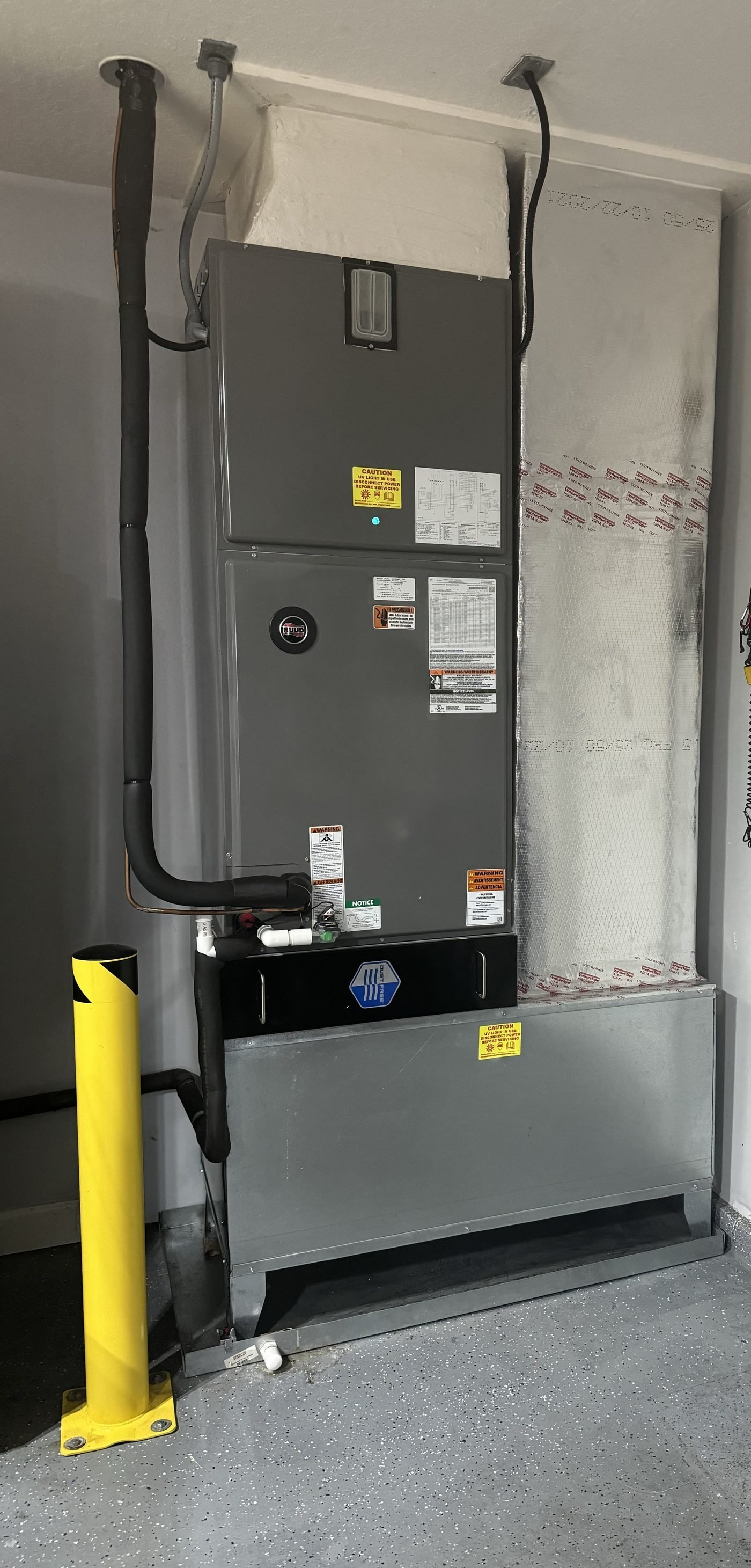Air handler on platform with insulated ductwork