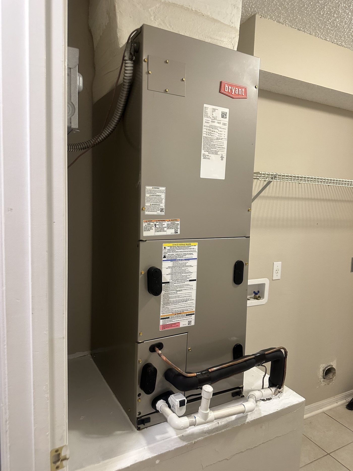 Bryant air handler tall unit utility room installation